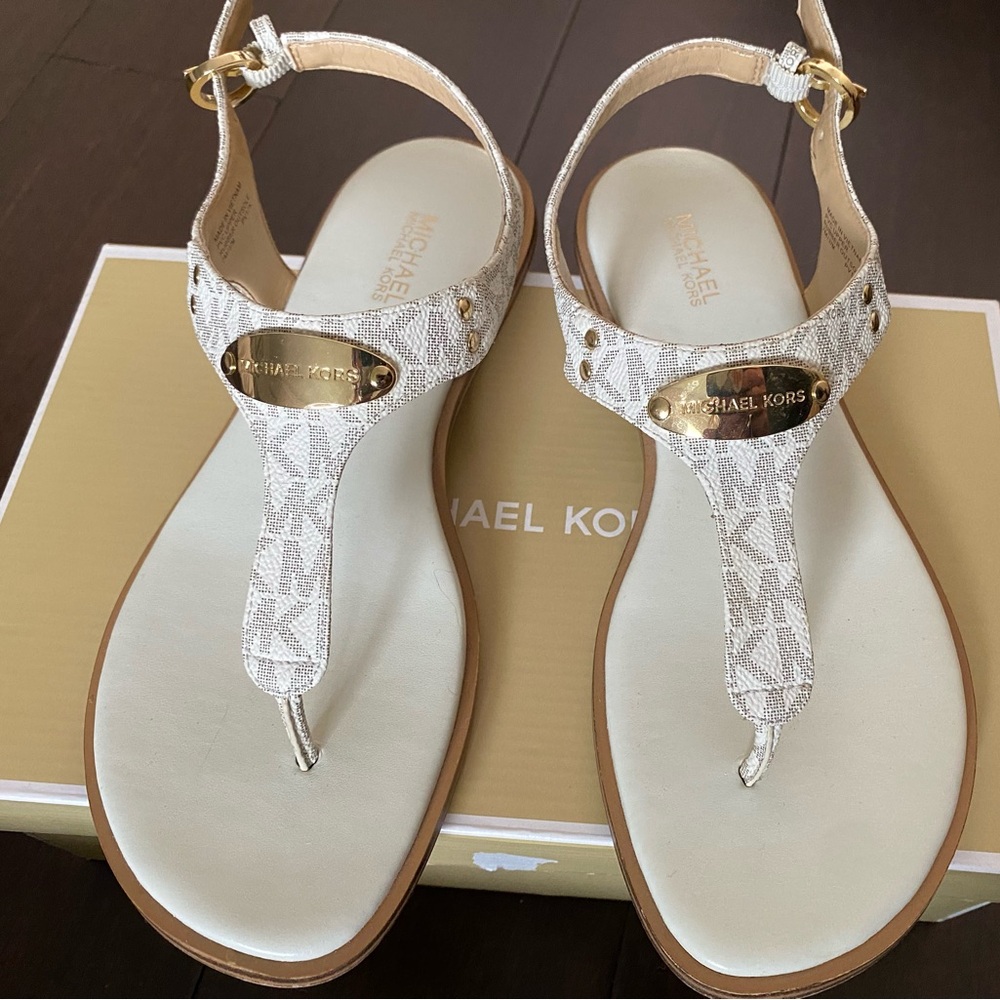 Michael Kors plate thong sandals with mini MK logo size 7M Like new with box.